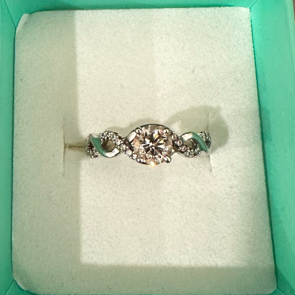 Gorgeous Diamond Ring with 5mm stone set in 14k white gold